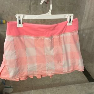 Lululemon coral plaid tennis skirt.